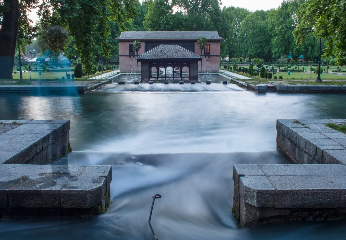 Water running through the stone channels of Achabal Garden