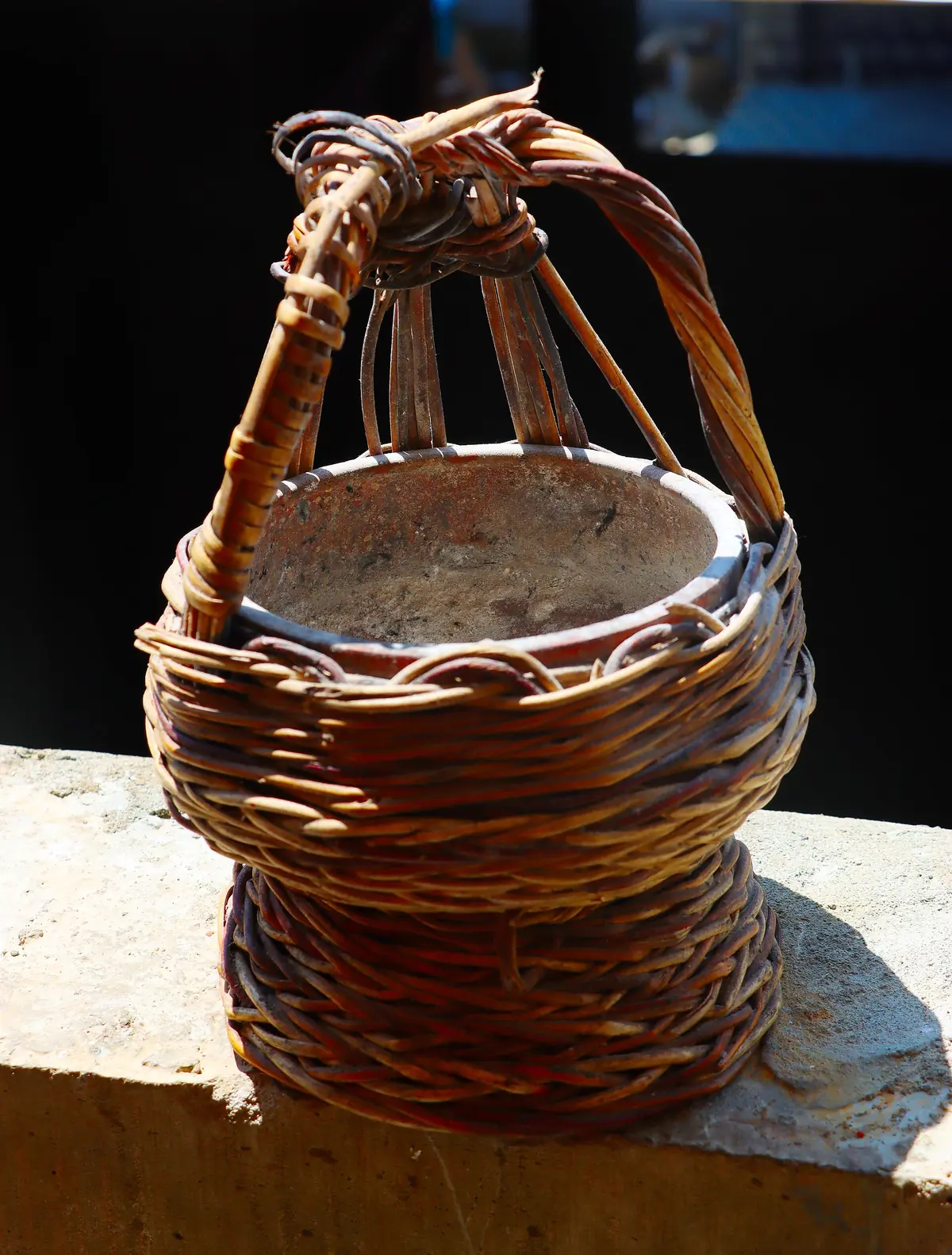 A kangri, the wicker-wrapped earthen fire pot used in Kashmiri winters