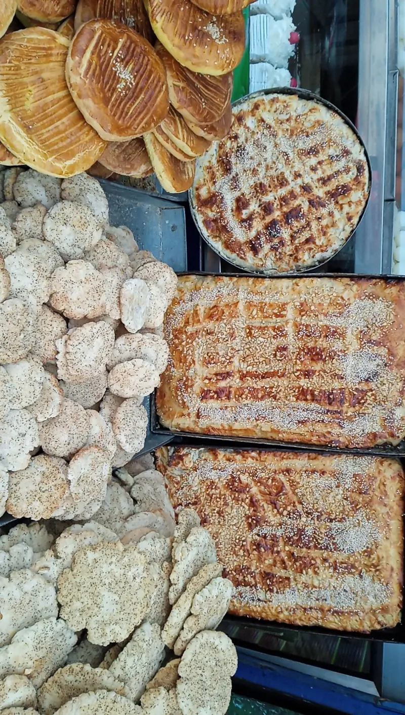 Trays of Kashmiri breads at a traditional bakery
