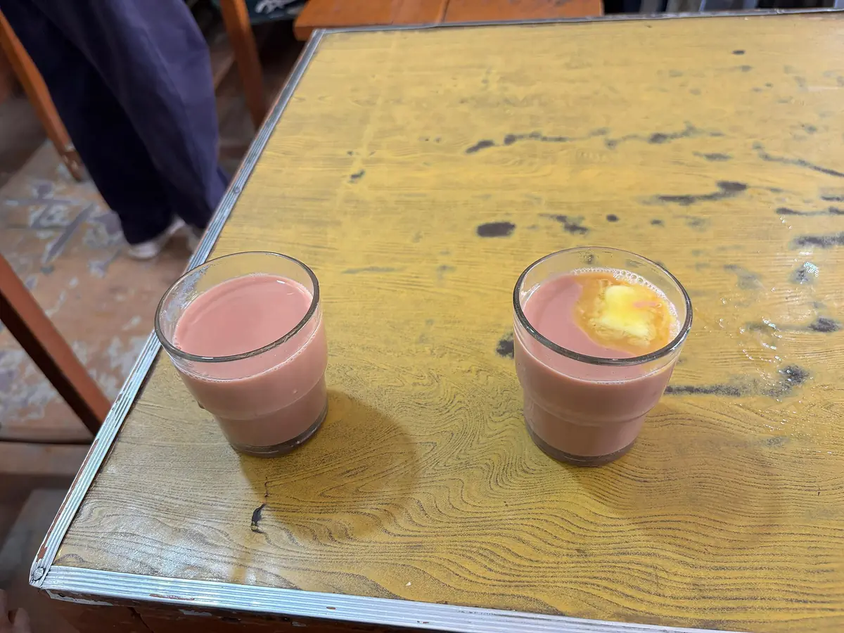 Two glasses of pink noon chai